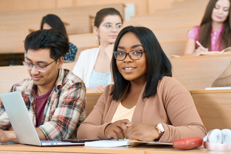 groupmates-learning-university-girl-looking-camera